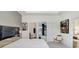 Open and airy main bedroom showing views into the main bath and walk-in closet at 31426 Ancient Sage Rd, Wesley Chapel, FL 33545