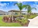 Community park with picnic shelter and play area surrounded by lush landscaping at 31426 Ancient Sage Rd, Wesley Chapel, FL 33545
