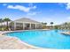 Community pool and clubhouse for relaxing and socializing in a resort-like setting at 31426 Ancient Sage Rd, Wesley Chapel, FL 33545