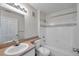 Bathroom with a shower and tub combination, vanity and sink with a vanity mirror at 36243 Lake Chase Blvd # 102, Zephyrhills, FL 33541