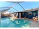 Outdoor pool area with hot tub and decorative touches at 3628 Holiday Lake Dr, Holiday, FL 34691