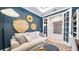 Comfortable living room with stylish decor, including decorative wall art and a cozy sofa at 3840 Consolare Ct, Wesley Chapel, FL 33543
