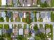 Aerial view of the property showcasing its location, landscaping, and surrounding neighborhood at 3909 W Lemon St, Tampa, FL 33609