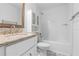 Bright bathroom featuring a shower/tub combination and updated vanity at 3909 W Lemon St, Tampa, FL 33609