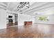 The open floor plan living room offers a glimpse of the updated kitchen and plenty of light and space at 3909 W Lemon St, Tampa, FL 33609