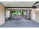 Comfortable screened porch with views of the private, landscaped backyard at 3909 W Lemon St, Tampa, FL 33609