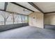 Cozy screened porch with a ceiling fan, offering a tranquil space to enjoy the outdoors at 3909 W Lemon St, Tampa, FL 33609