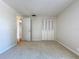 Bright bedroom with neutral carpet and closet, creates a peaceful and inviting atmosphere at 4030 Braesgate Ln, Tampa, FL 33624