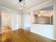 Living room view showing hardwood floors and doorway to the rest of the home at 4030 Braesgate Ln, Tampa, FL 33624