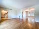 Spacious living room with hardwood floors, open floor plan, and lots of natural light at 4030 Braesgate Ln, Tampa, FL 33624
