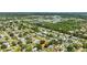 Property view with mature trees, green lawns, and a peaceful residential neighborhood at 4391 Ne Cherry Ne St, St Petersburg, FL 33703