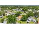 A cozy neighborhood with mature trees, well-kept lawns, and single-story homes at 4391 Ne Cherry Ne St, St Petersburg, FL 33703