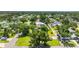 Overhead shot of a tree lined neighborhood, showcasing the houses below at 4391 Ne Cherry Ne St, St Petersburg, FL 33703