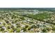 Property view with lush trees, well-kept lawns, and a quiet residential neighborhood at 4391 Ne Cherry Ne St, St Petersburg, FL 33703