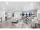 Bright living room with neutral paint, recessed lights, and stylish seating arrangement at 4391 Ne Cherry Ne St, St Petersburg, FL 33703