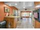 Open kitchen layout seamlessly connects to the dining area with ample natural light at 525 Skylark Nw Ln, Port Charlotte, FL 33952