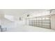 Clean, oversized two car garage with sink and plenty of room for storage at 5253 Boardwalk St, Holiday, FL 34690