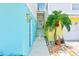Colorful walkway leading to the front door and garage at 5253 Boardwalk St, Holiday, FL 34690