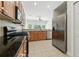Well-equipped kitchen features stainless steel appliances and ample cabinet space at 5390 Greystone Dr, Spring Hill, FL 34609
