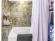 Relaxing bathroom featuring a white tub with shower and diagonally tiled shower walls at 5401 7Th N Ave, St Petersburg, FL 33710