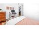 Bedroom with desk, dresser, and hardwood floors at 5401 7Th N Ave, St Petersburg, FL 33710