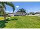 Charming home with a well-maintained front yard and a white privacy fence at 5401 7Th N Ave, St Petersburg, FL 33710