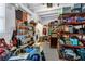 Organized garage with shelving units, storage boxes, and ample space for vehicles and equipment at 5401 7Th N Ave, St Petersburg, FL 33710