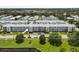 A nice aerial view of the condominium buildings and surrounding green space in a desirable location at 6000 20Th N St # 123, St Petersburg, FL 33714