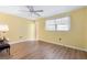 Bright bedroom with wood floors, large window, and neutral color palette at 6000 20Th N St # 123, St Petersburg, FL 33714