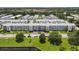 The condo building has manicured lawns and mature landscaping at 6000 20Th N St # 123, St Petersburg, FL 33714