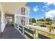 Exterior hallway featuring unit doors, and access to scenic views at 6000 20Th N St # 123, St Petersburg, FL 33714