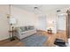 Neutral living room featuring ceiling fan, carpet, and comfortable sofa at 6000 20Th N St # 123, St Petersburg, FL 33714