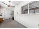 Simple living room with carpet, ceiling fan and windows at 6000 20Th N St # 123, St Petersburg, FL 33714