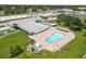 Aerial view of a pool, and tennis courts at 6000 20Th N St # 123, St Petersburg, FL 33714