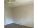 Bright bedroom with a ceiling fan and ample closet space at 6262 142 N Ave # 1001, Clearwater, FL 33760