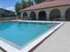 Exterior image showcasing a refreshing community pool with plenty of space to lounge at 6262 142 N Ave # 1001, Clearwater, FL 33760