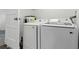 Laundry room featuring new front-loading washer and dryer at 6301 Hobson Ne St, St Petersburg, FL 33702