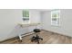 Bright office space with wood floors and a work desk and stool at 6301 Hobson Ne St, St Petersburg, FL 33702