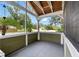 An outdoor screened-in porch providing a relaxing space with views of the neighborhood at 6301 Hobson Ne St, St Petersburg, FL 33702