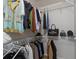 Walk-in closet featuring wire shelving and clothing at 7001 Interbay Blvd # 219, Tampa, FL 33616