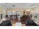 Large clubhouse with hardwood floors, pool table, dining space, kitchen, and sitting area at 7001 Interbay Blvd # 219, Tampa, FL 33616
