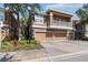 Charming multi-level condo with stone accents, second story balcony, and attached two car garage at 7001 Interbay Blvd # 219, Tampa, FL 33616