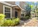 Charming two-story home with well-maintained landscaping and a front door at 7001 Interbay Blvd # 219, Tampa, FL 33616