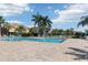Inviting community pool surrounded by lounge chairs and lush landscaping at 7001 Interbay Blvd # 219, Tampa, FL 33616