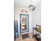 Charming front entrance with a decorative wreath, 'Welcome' sign, and brick-paved landing at 717 Manchester Woods Dr # 717, Sun City Center, FL 33573