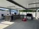 Amazing outdoor kitchen and bar area with stainless steel appliances, ample counter space, and stylish design, perfect for entertaining at 7321 W Pocahontas Ave, Tampa, FL 33634