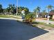 Charming home exterior with lush landscaping and inviting curb appeal on a quiet street at 7321 W Pocahontas Ave, Tampa, FL 33634