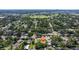 Aerial view highlighting the property's location near a park, baseball fields, and established neighborhood at 8200 31St N Ter, St Petersburg, FL 33710