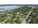 Aerial view of neighborhood with a glimpse of the lake in the background at 8200 31St N Ter, St Petersburg, FL 33710