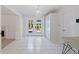 Open dining area with french doors to the outdoor pool and patio area at 8200 31St N Ter, St Petersburg, FL 33710